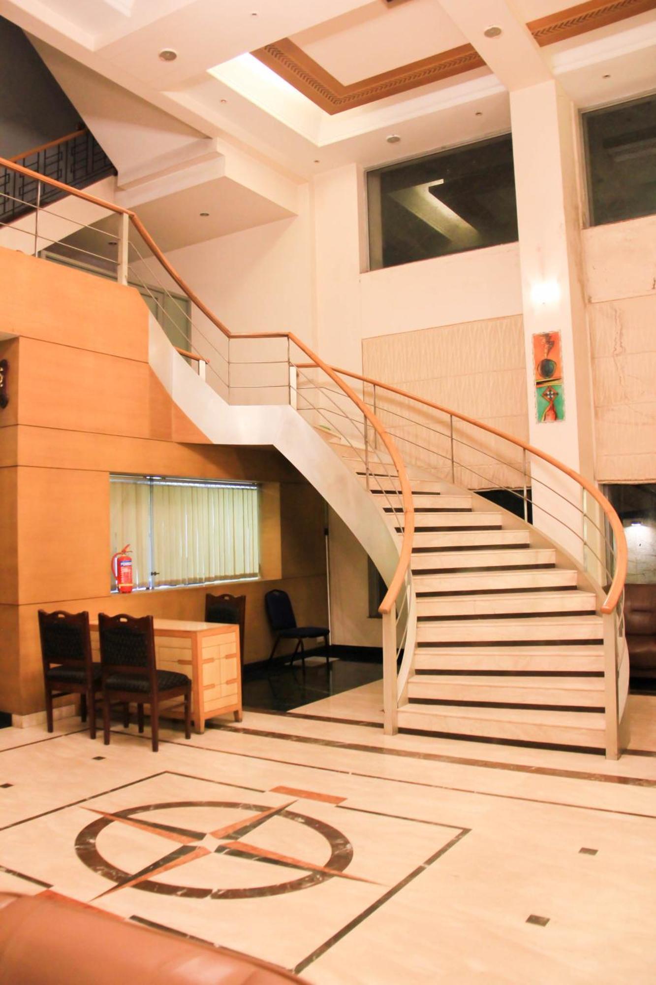 The Ambassador Hotel Пюн Екстериор снимка